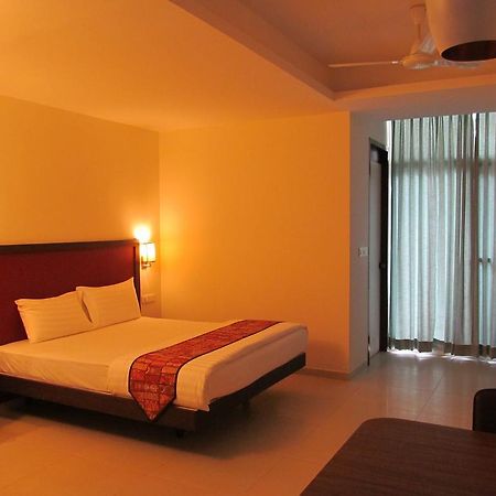 Ixora Suites Bangalore Kamer foto
