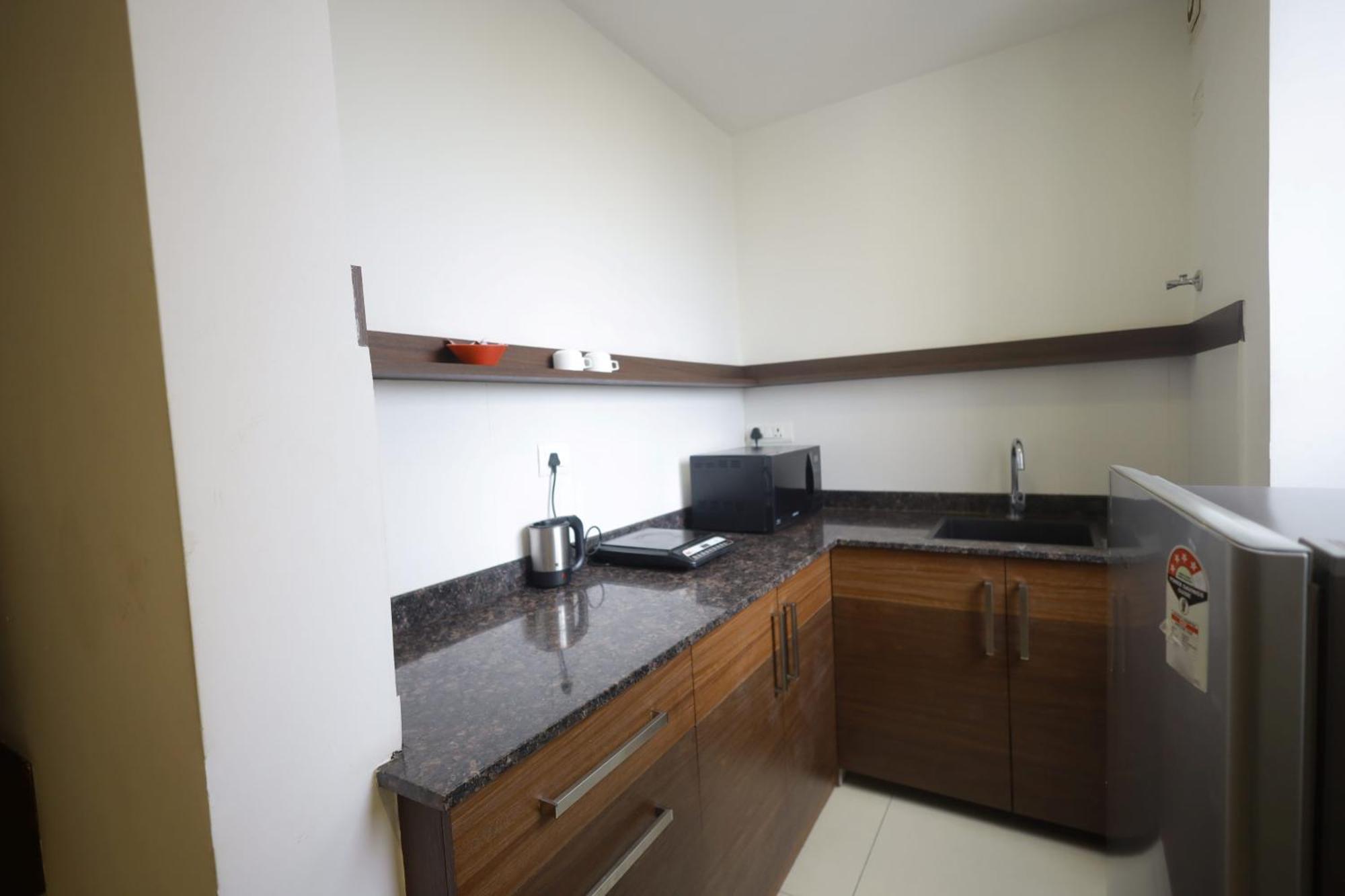 Ixora Suites Bangalore Buitenkant foto