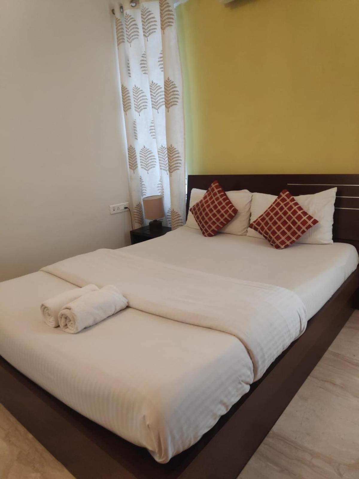 Ixora Suites Bangalore Buitenkant foto