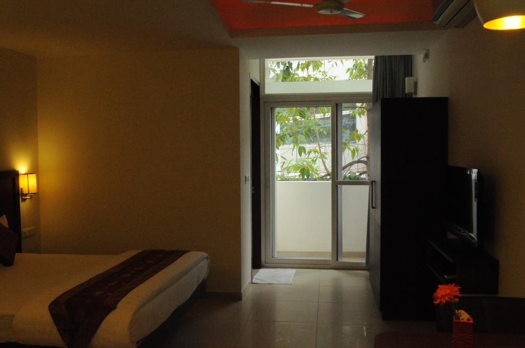 Ixora Suites Bangalore Kamer foto