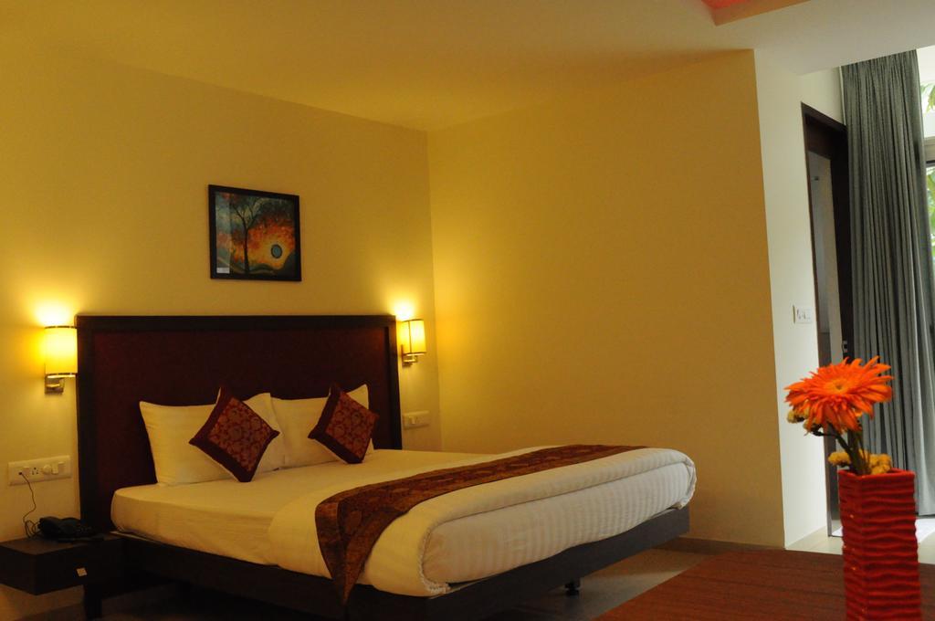 Ixora Suites Bangalore Kamer foto