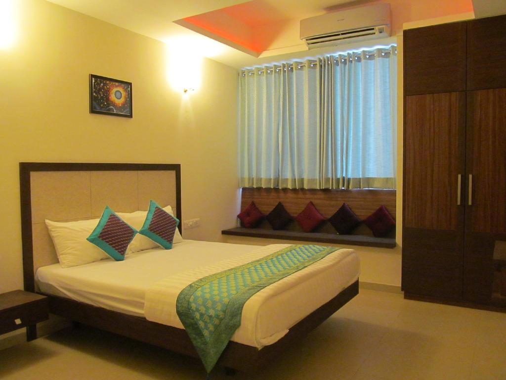 Ixora Suites Bangalore Kamer foto