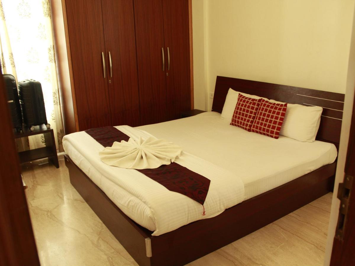 Ixora Suites Bangalore Buitenkant foto