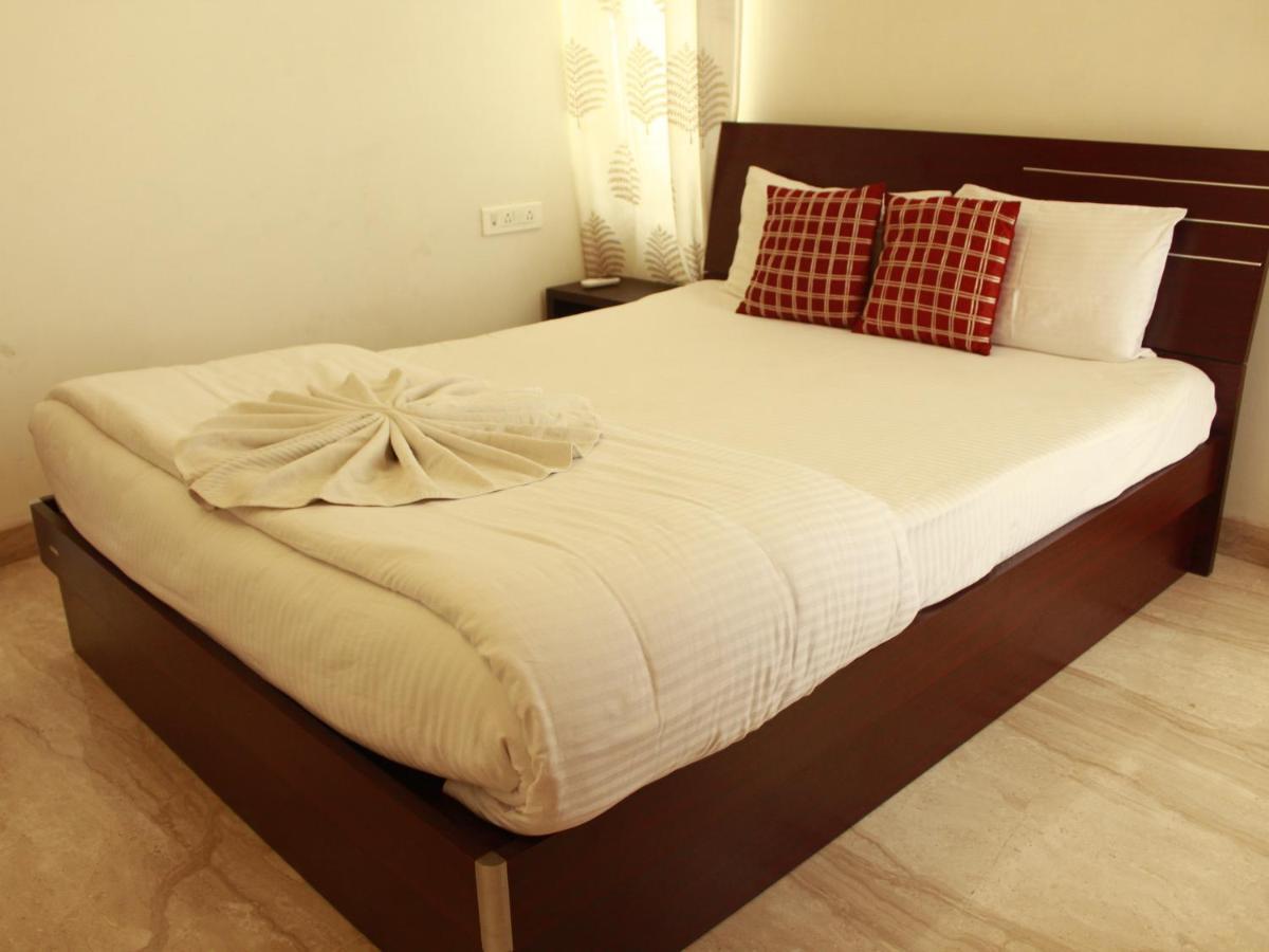 Ixora Suites Bangalore Buitenkant foto